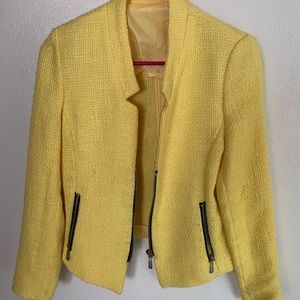 Modern yellow blazer with black zippers